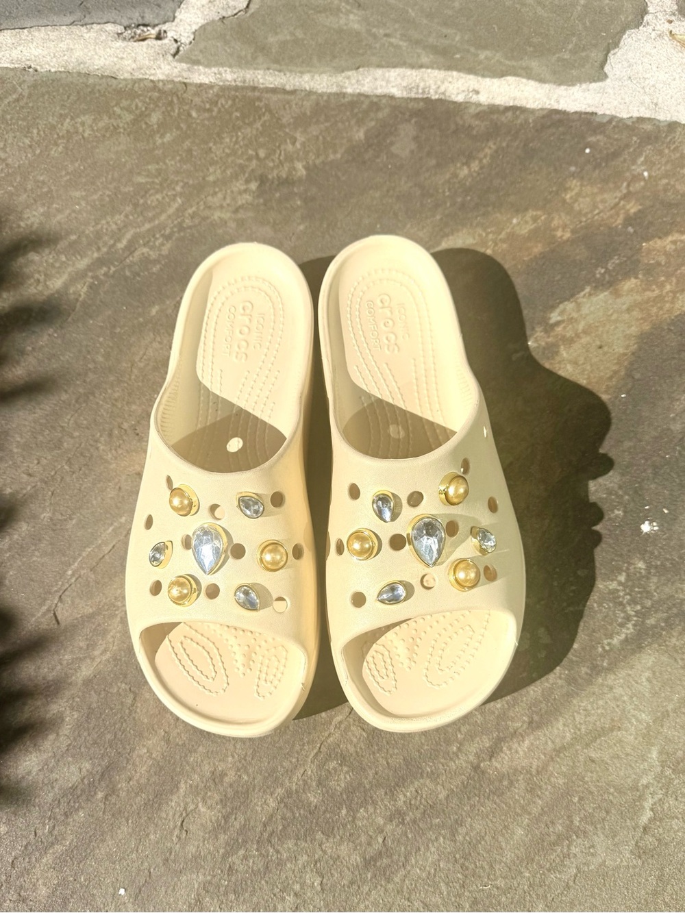 CROCS Beige Slide Sandals with Gold and Silver Gem Accents